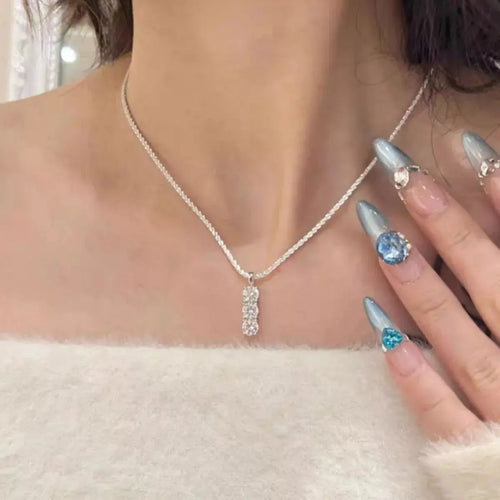 Moissanite sterling silver bar necklace from Vicsxox