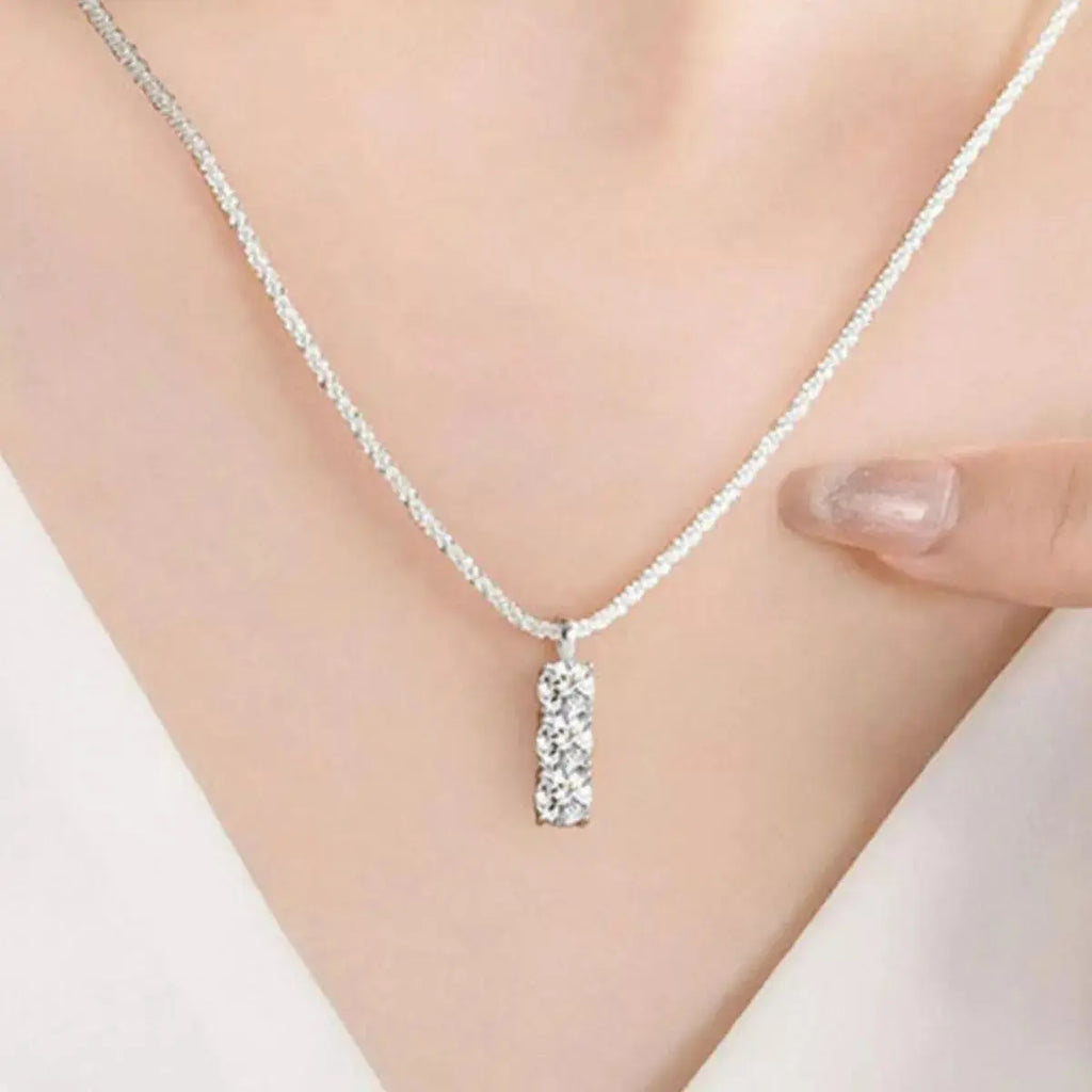 0.9ct Three-Stone Moissanite Vertical Bar Pendant Necklace in Sterling Silver Vicsxox.com