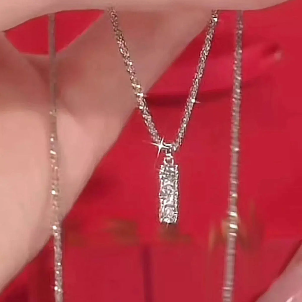 0.9ct Three-Stone Moissanite Vertical Bar Pendant Necklace in Sterling Silver Vicsxox.com