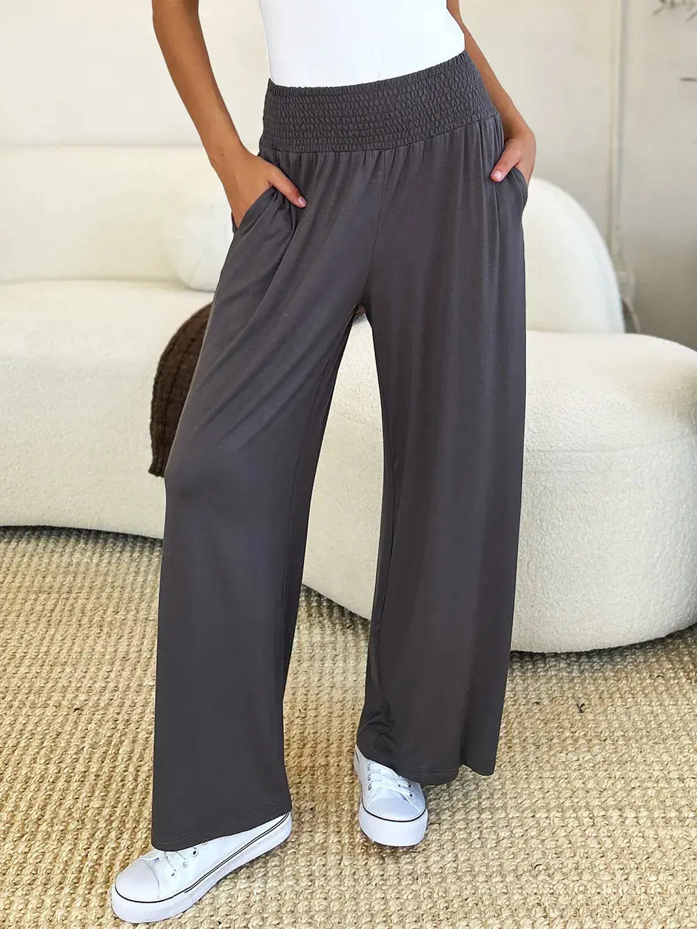Smocked wide waistband pants styled on model