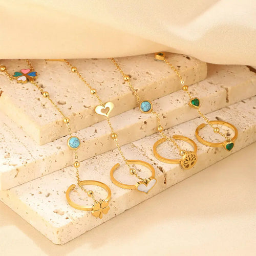 Close-up of resin and rhinestone detail on gold bracelet