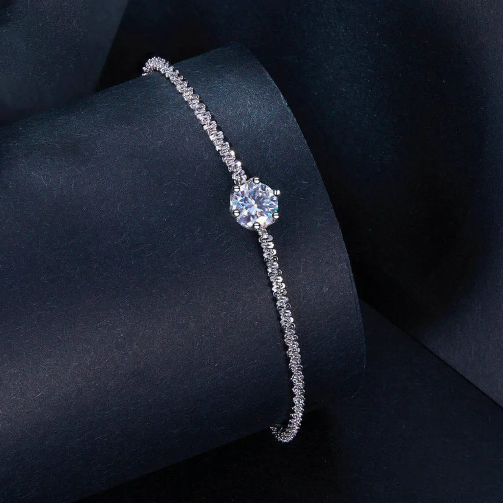 Woman wearing silver zircon bracelet