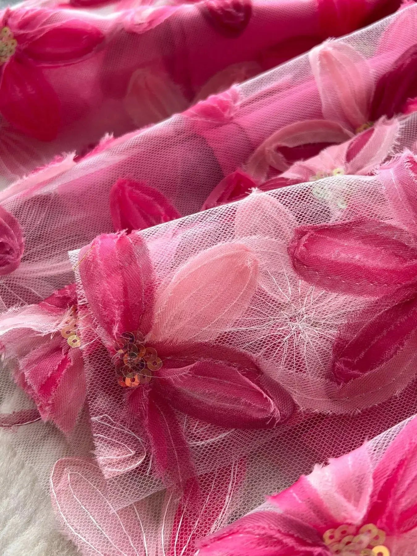 Floral mesh skirt detail