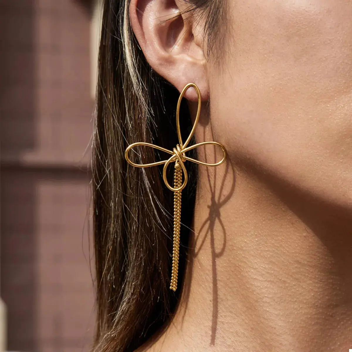 18K gold-plated tassel bow earrings from Vicsxox