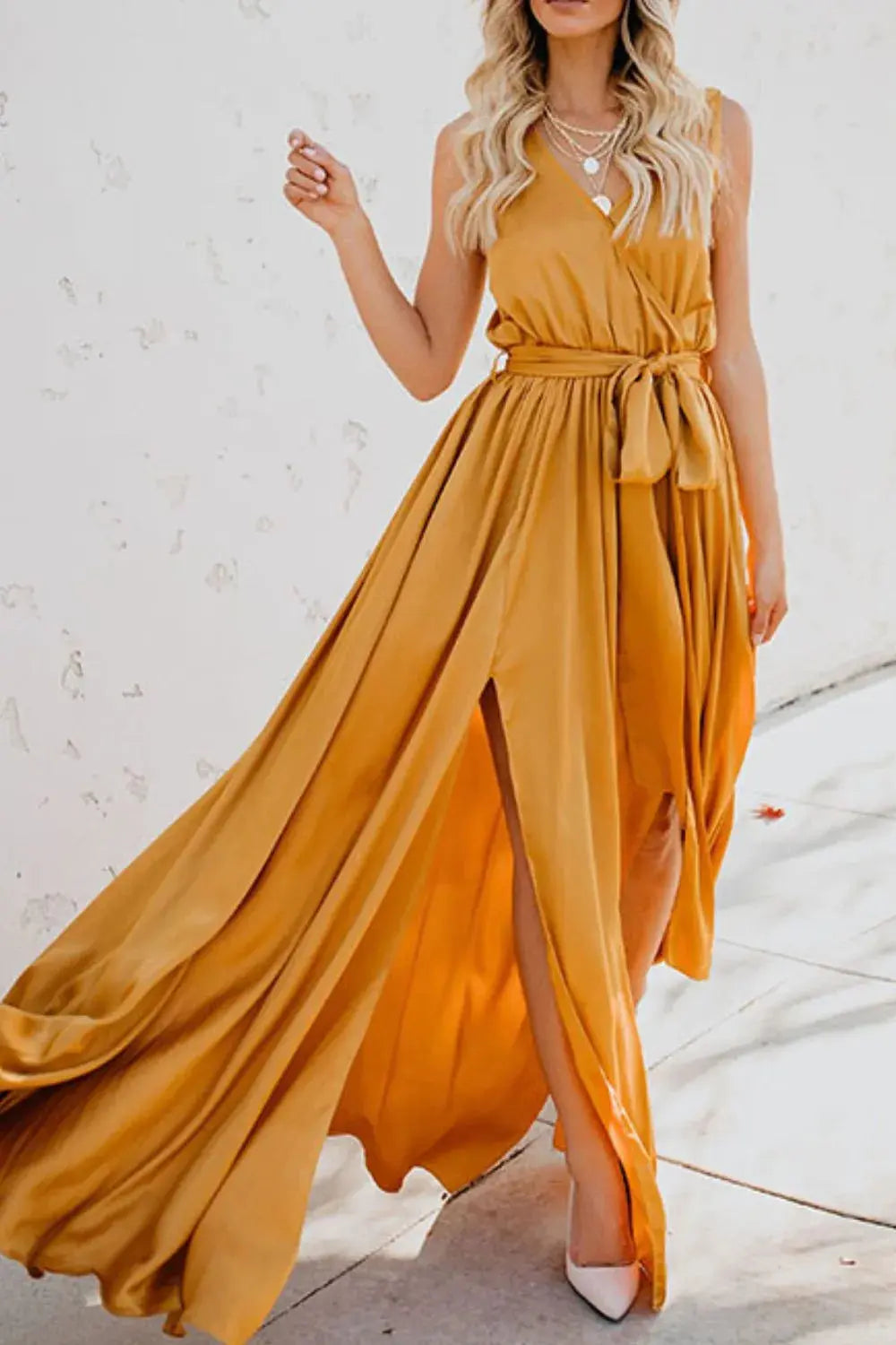 Close-up of tied waist detail on surplice maxi dress