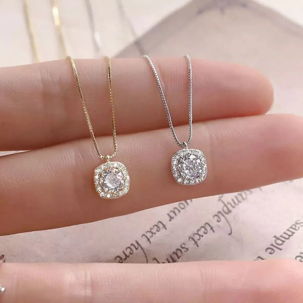 Woman wearing silver zircon pendant necklace