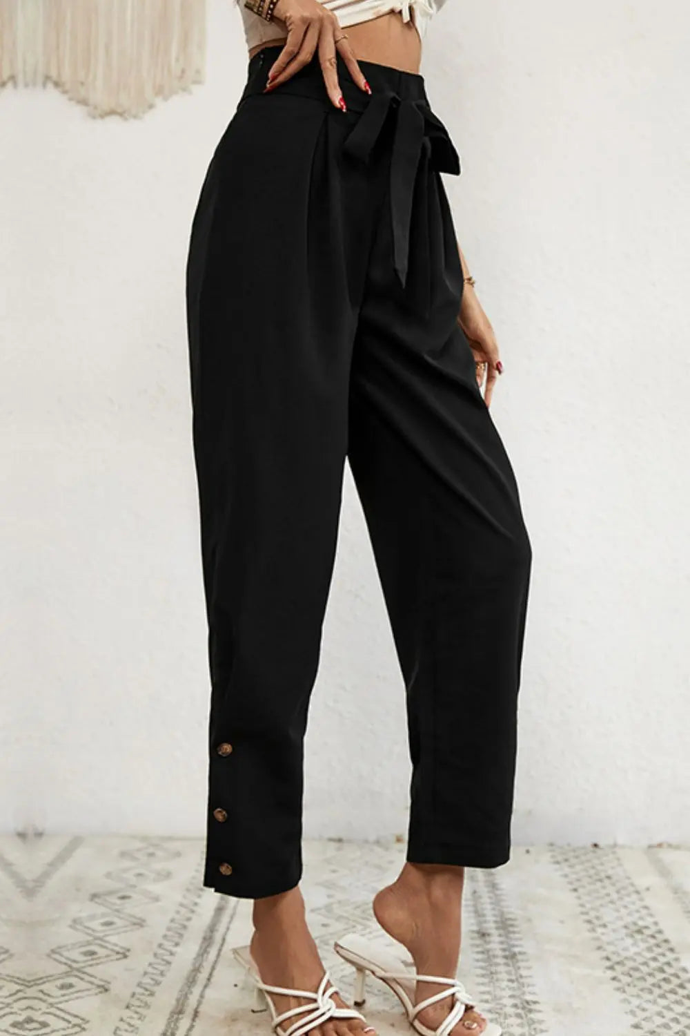 Buttoned tie-waist cropped pants styled on model