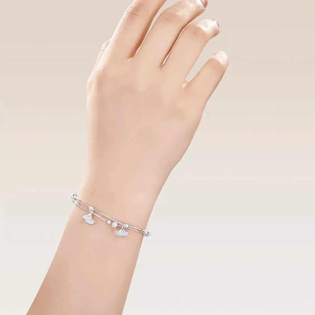 Woman wearing double layer ginkgo leaf bracelet