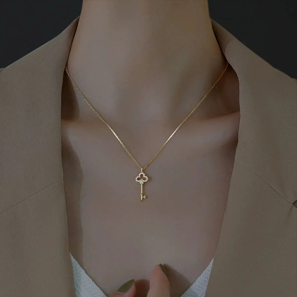 Close-up of key pendant with zircon accents