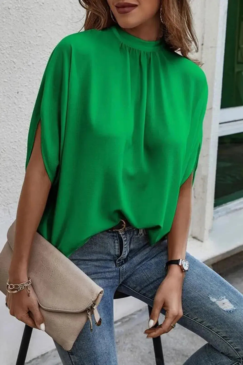 Close-up of sleeve slit detail on half sleeve blouse