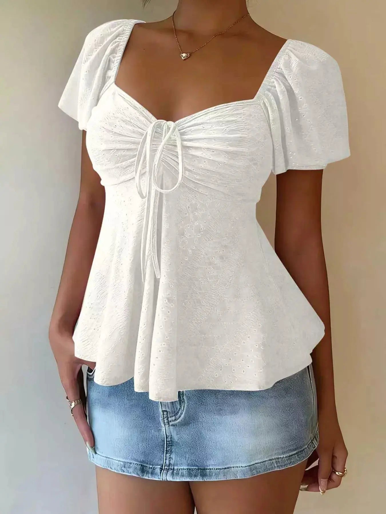 Woman wearing a sweetheart neck flutter sleeve top from Vicsxox