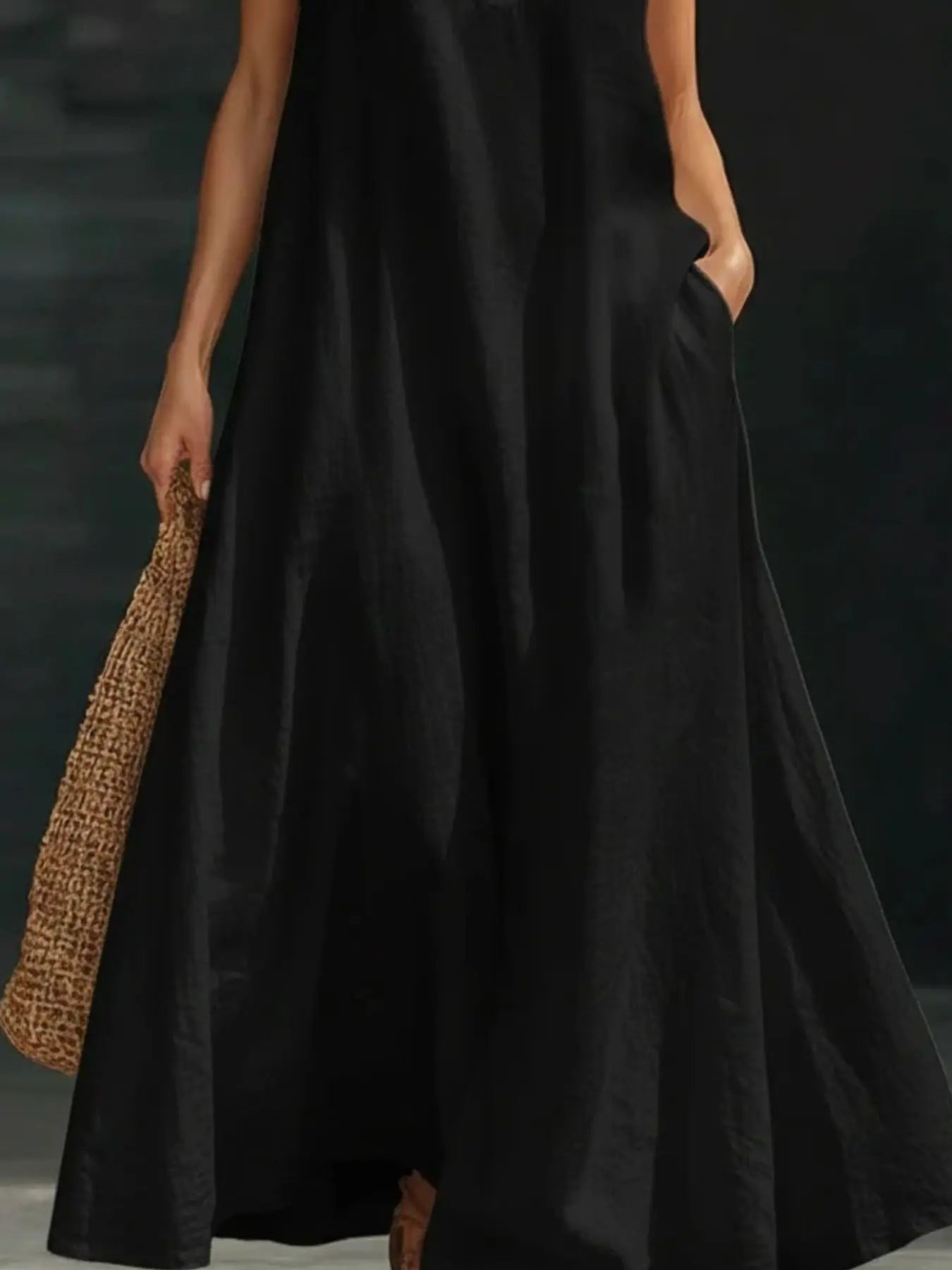 Side view of halter neck maxi dress with pockets