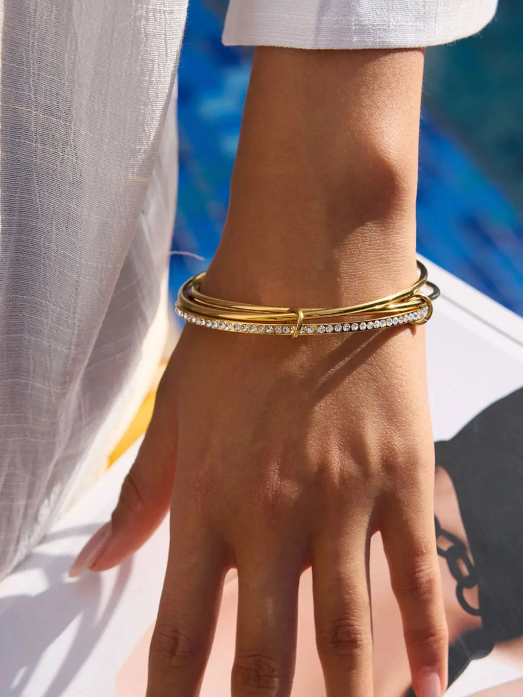 Close-up of zircon inlay on crossover bracelet