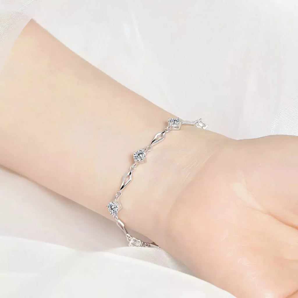 Woman wearing silver zircon bracelet