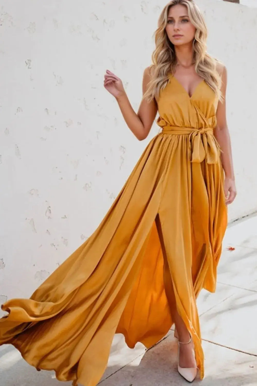 Woman wearing a surplice tie waist maxi dress from Vicsxox