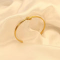 18K gold-plated knot open bracelet from Vicsxox