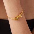 Titanium steel rhinestone letter bracelet, front view