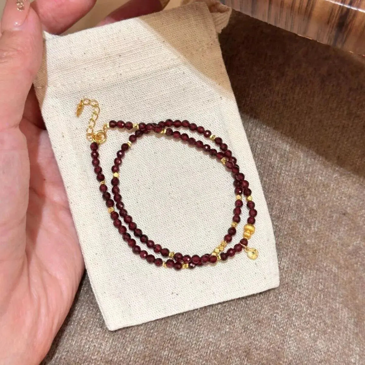 Woman wearing double layered beaded bracelet