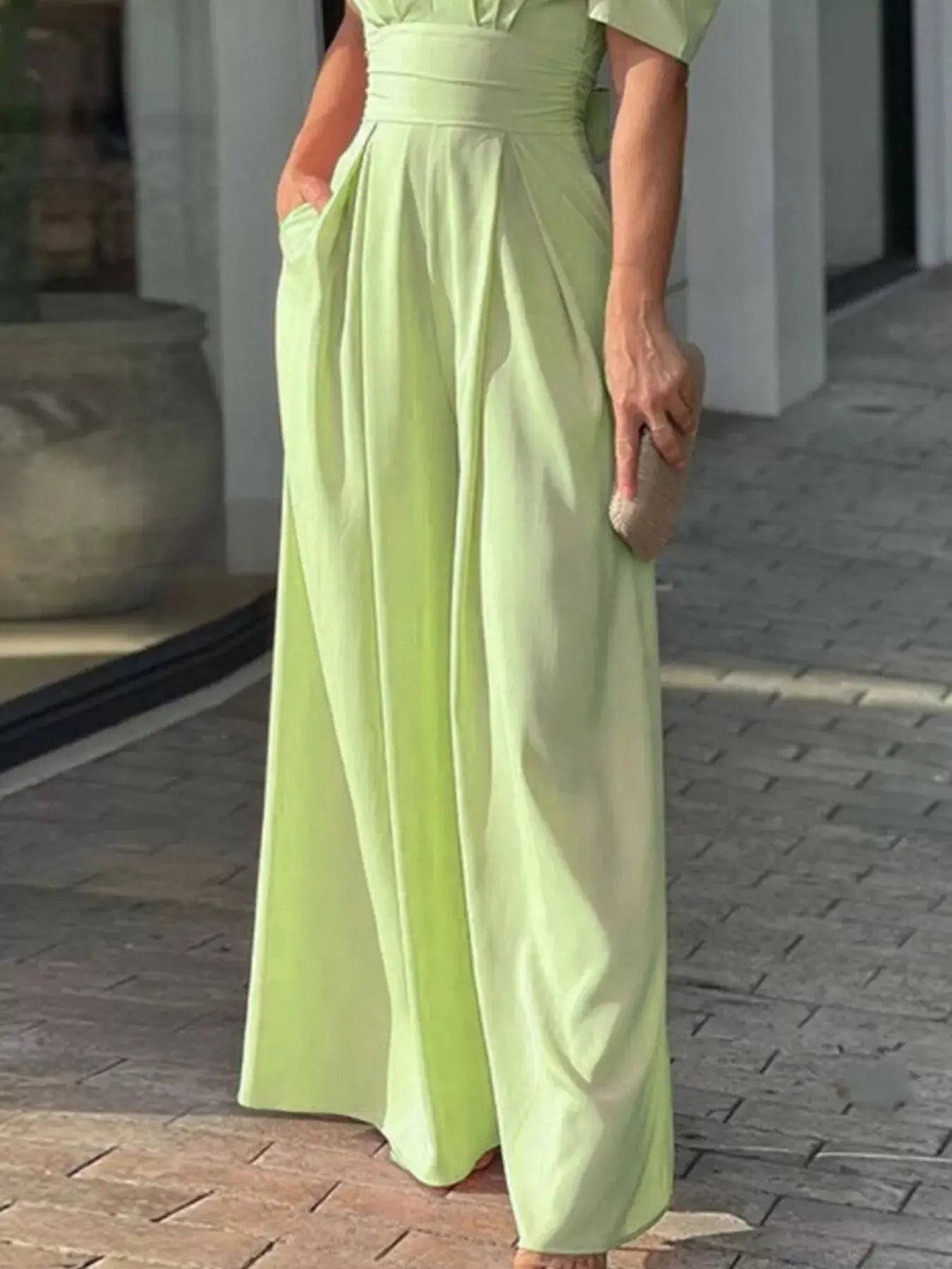 Full length view of puff sleeve jumpsuit