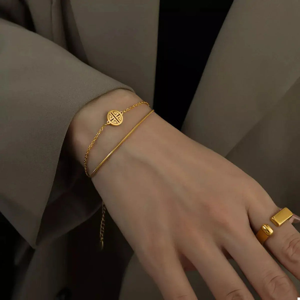 Close-up of double layer chain detail on gold bracelet