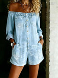 Woman wearing a plus-size off shoulder romper from Vicsxox
