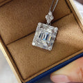 5ct Emerald-Cut Moissanite Baguette Halo Statement Pendant Necklace in Sterling Silver Vicsxox
