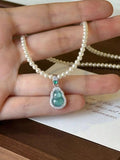 Gourd pendant pearl necklace from Vicsxox