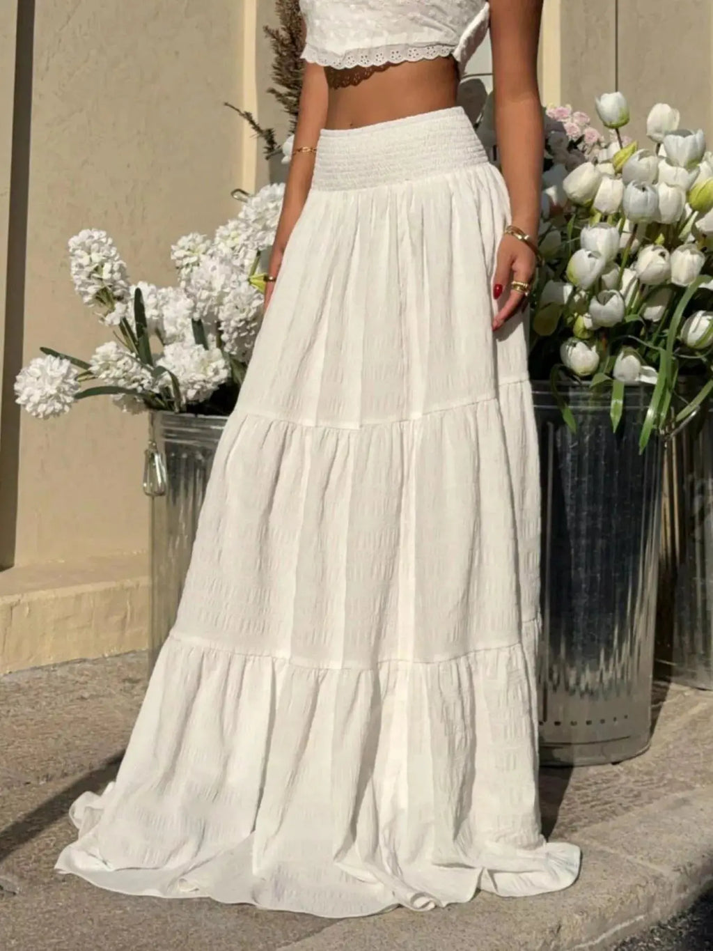 Smocked tiered maxi skirt detail