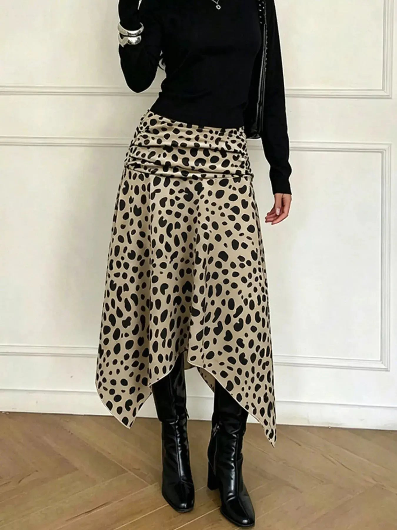 Leopard print midi skirt styled on model
