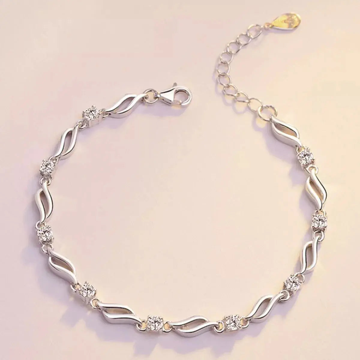 Close-up of zircon detail on silver bracelet