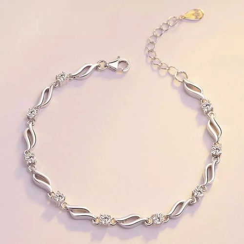 Close-up of zircon detail on silver bracelet