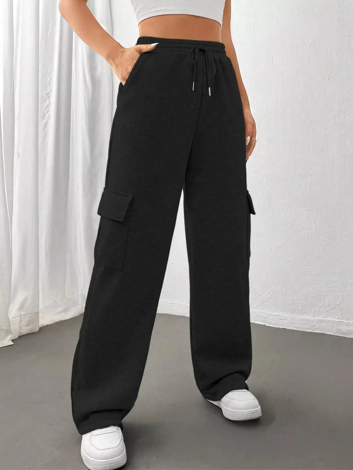 Relaxed fit pants with drawstring waist, front view