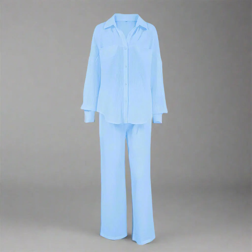 Light blue pajama set on a gray background