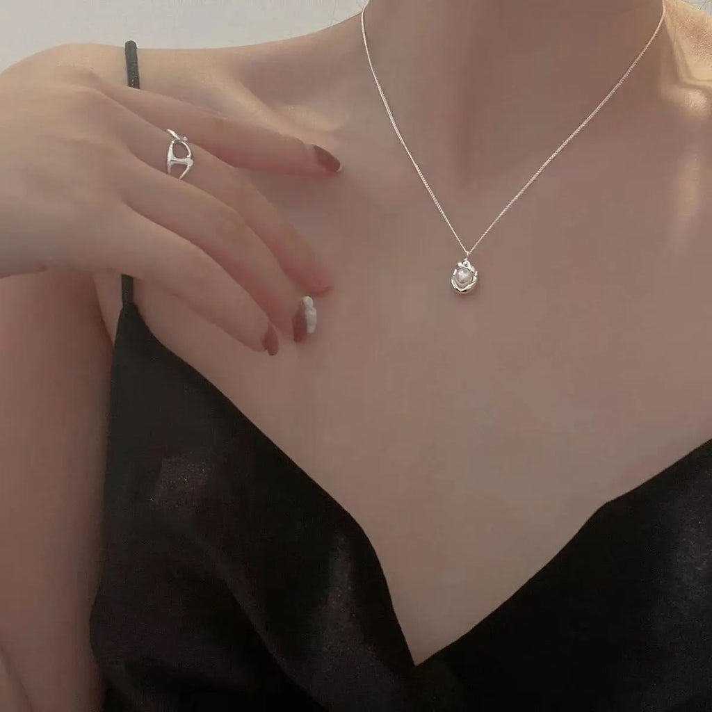 Sterling silver pearl pendant necklace styled on model