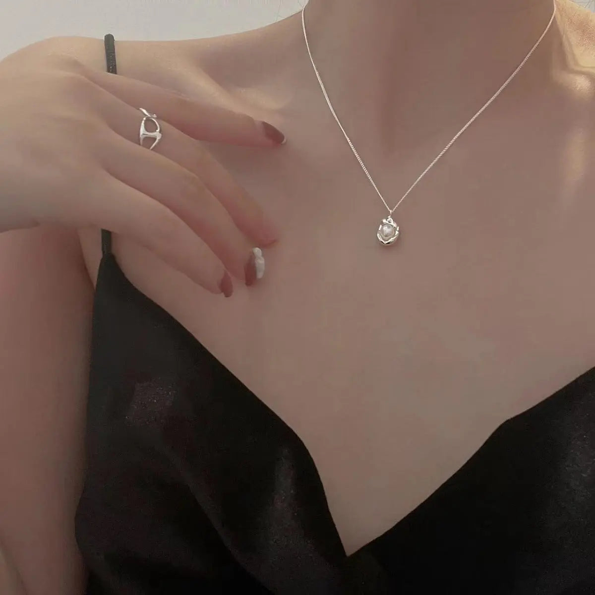 Sterling silver pearl pendant necklace styled on model