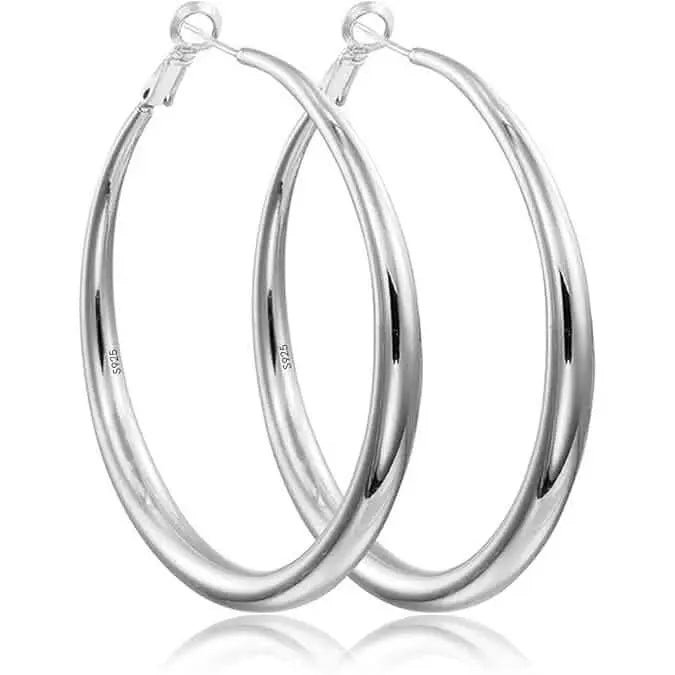 Pair of silver hoop earrings on a white background