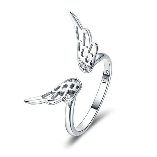 Close-up of angel wing detail on silver ring vicsxox.com