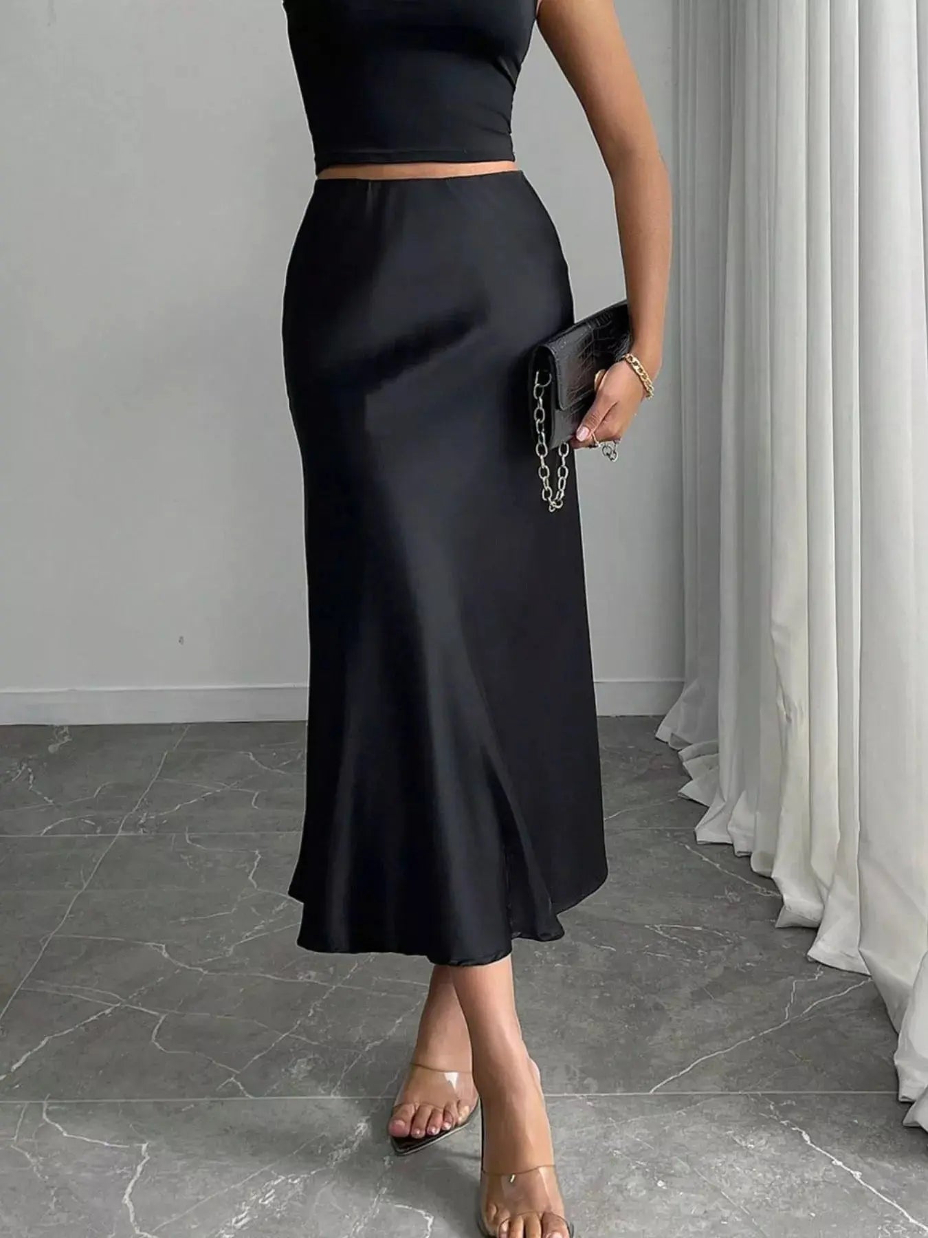 Satin midi skirt styled on model