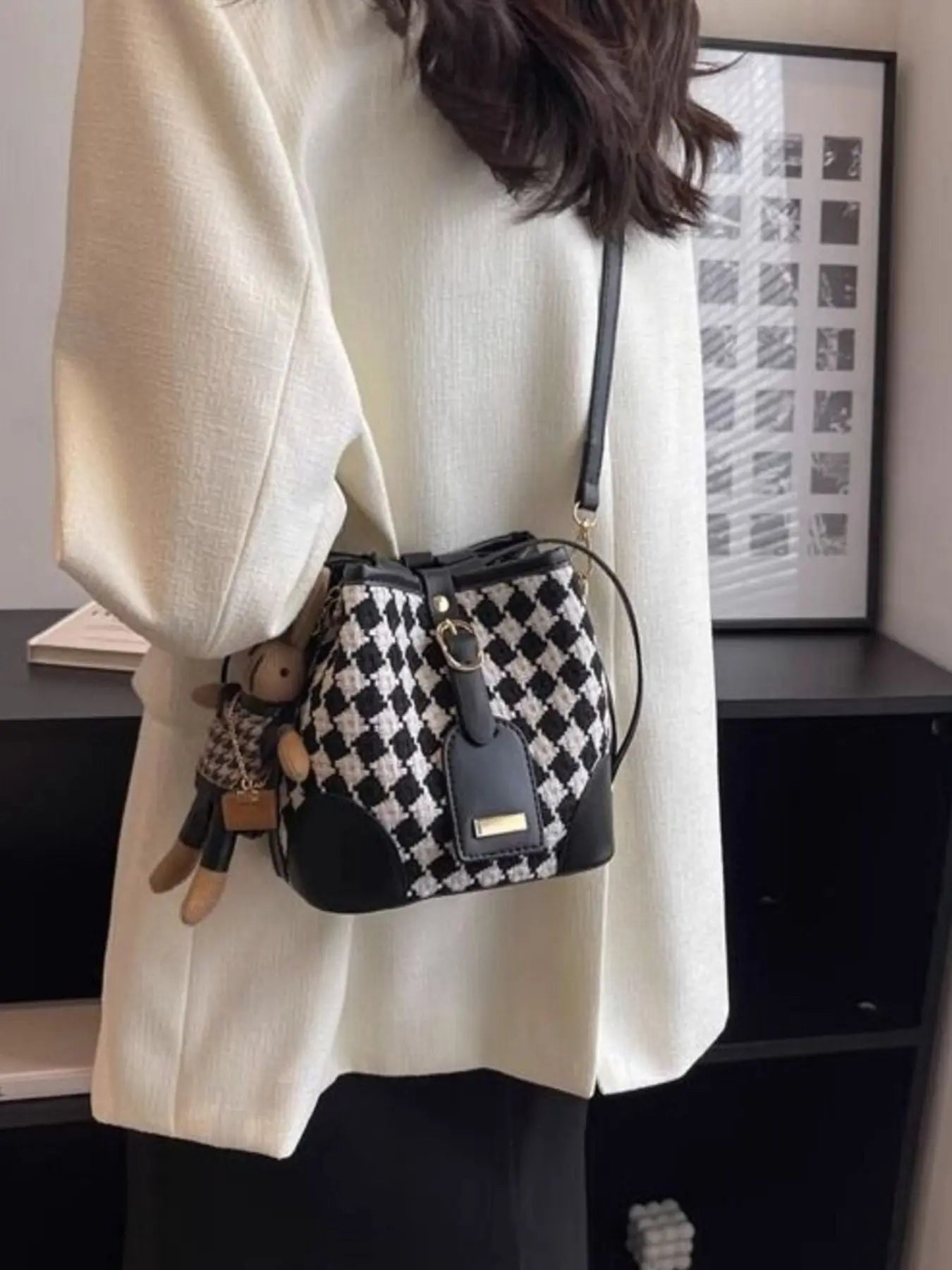 Checkerboard woven bucket crossbody bag styled on model Vicsxox.com