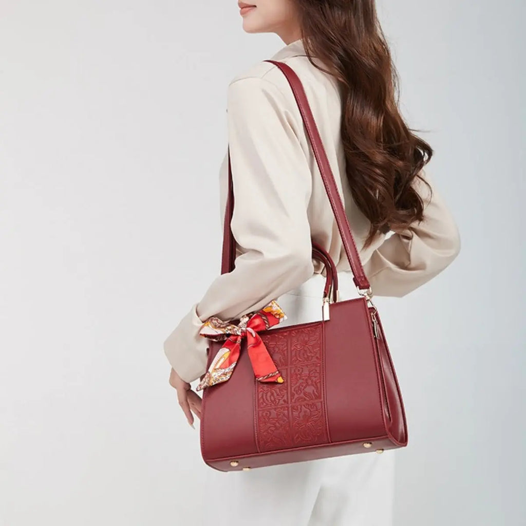 Embossed floral vegan leather top-handle handbag with scarf, front view Vicsxox.com