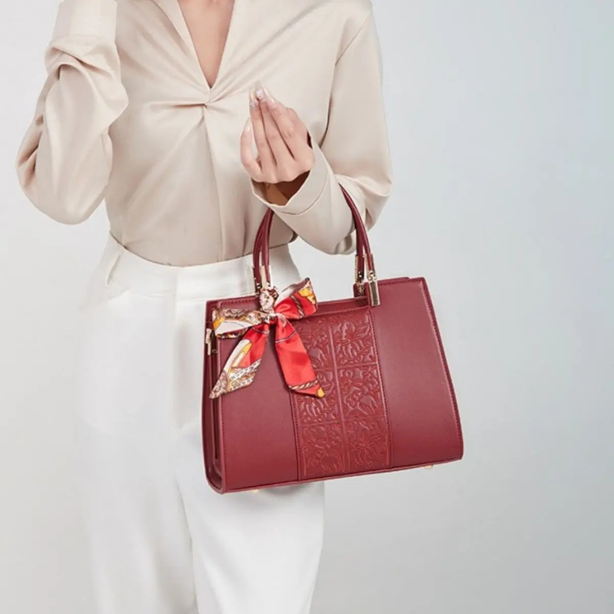 Embossed floral vegan leather top-handle handbag with scarf, front view Vicsxox.com