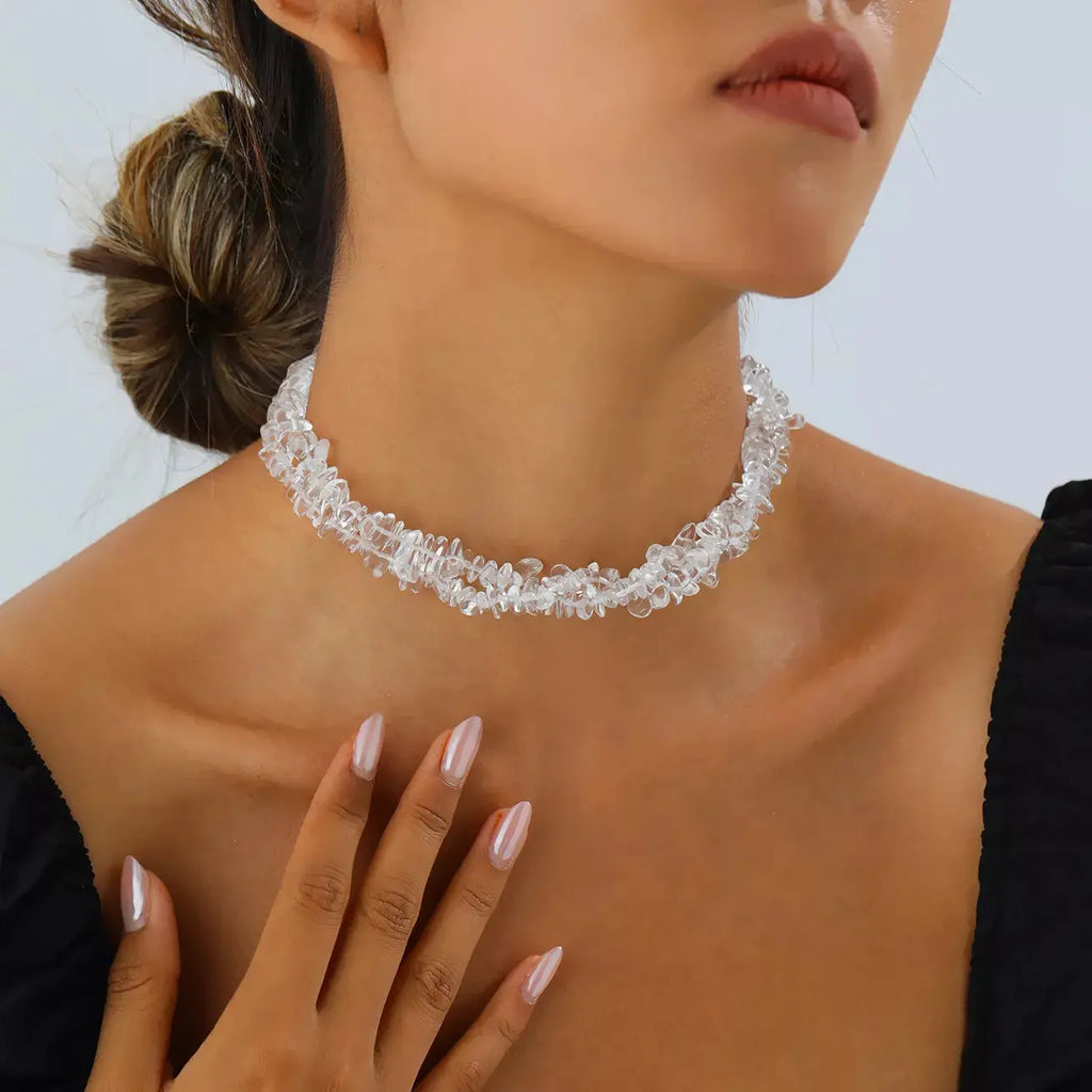 Woman wearing irregular glass choker necklace