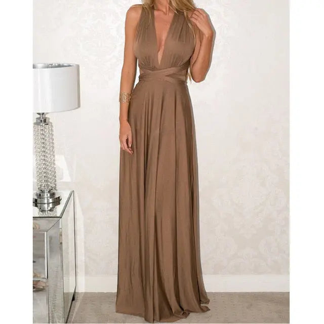 Woman wearing a brown evening gown in an indoor setting.