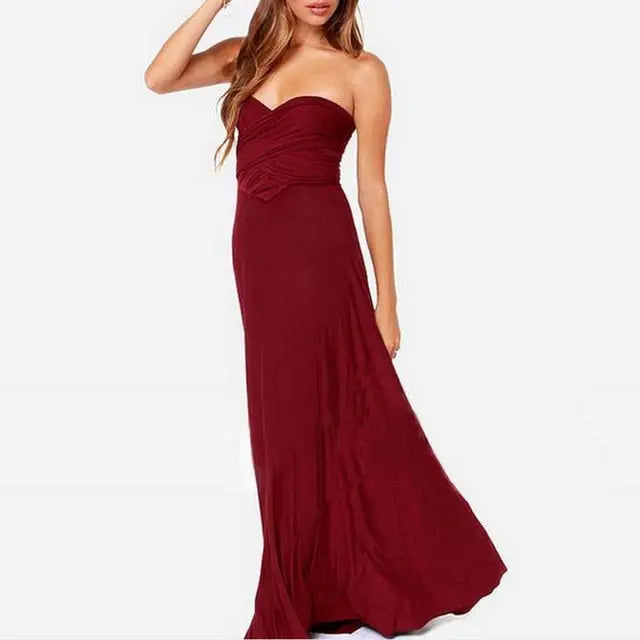 Burgundy strapless gown on a white background