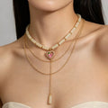 Layered heart pendant necklace with jade beads from Vicsxox