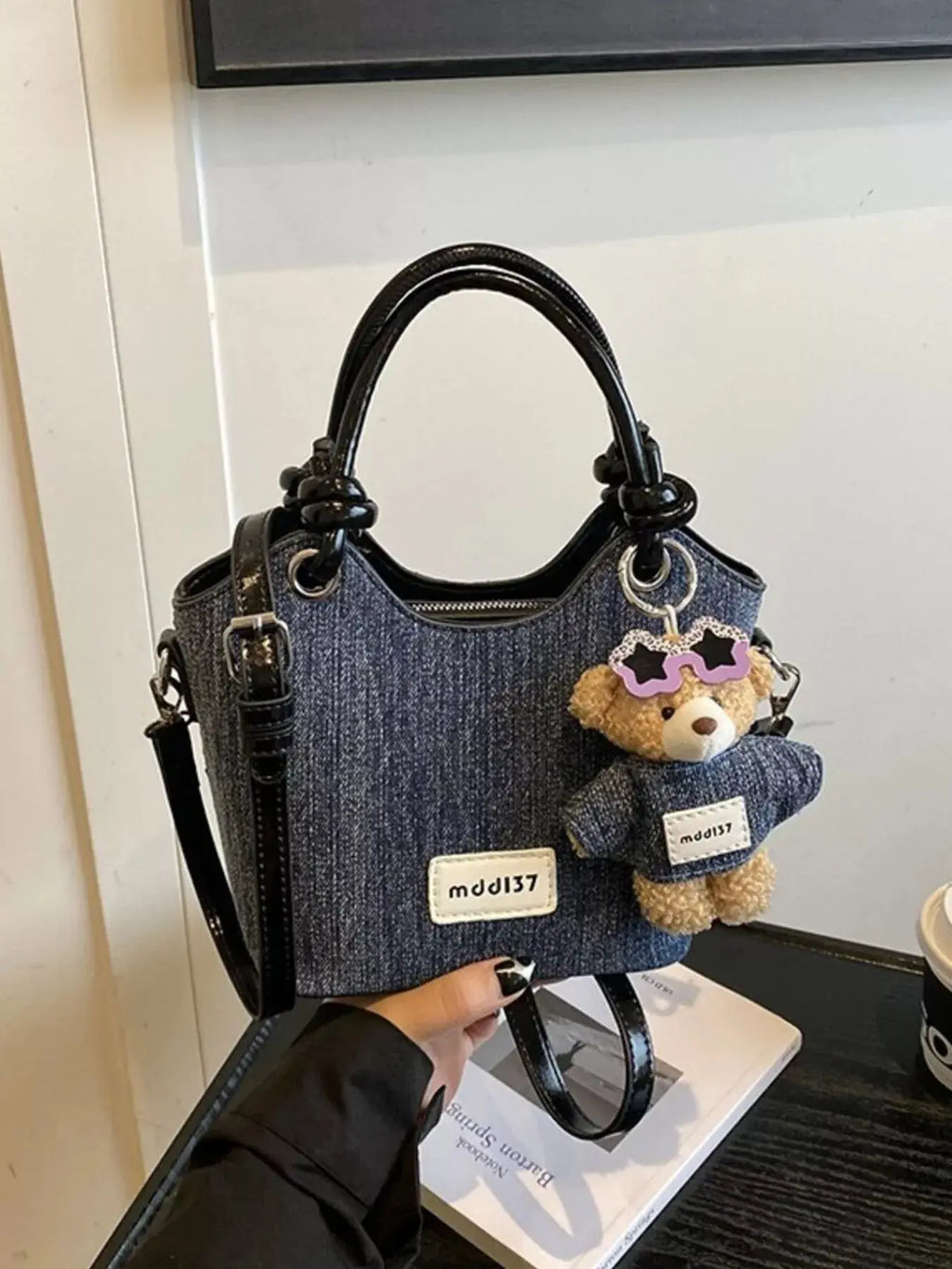 Mini denim top handle shoulder bag, front view
