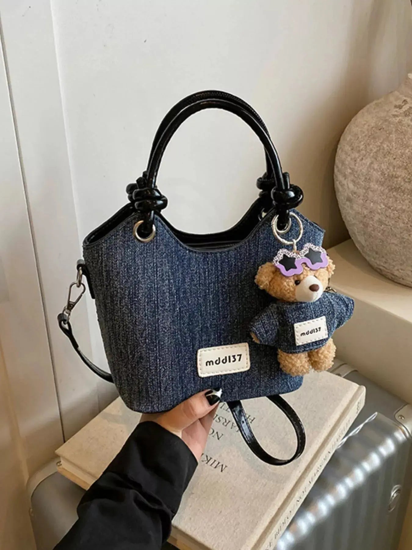 Mini denim top handle shoulder bag detail