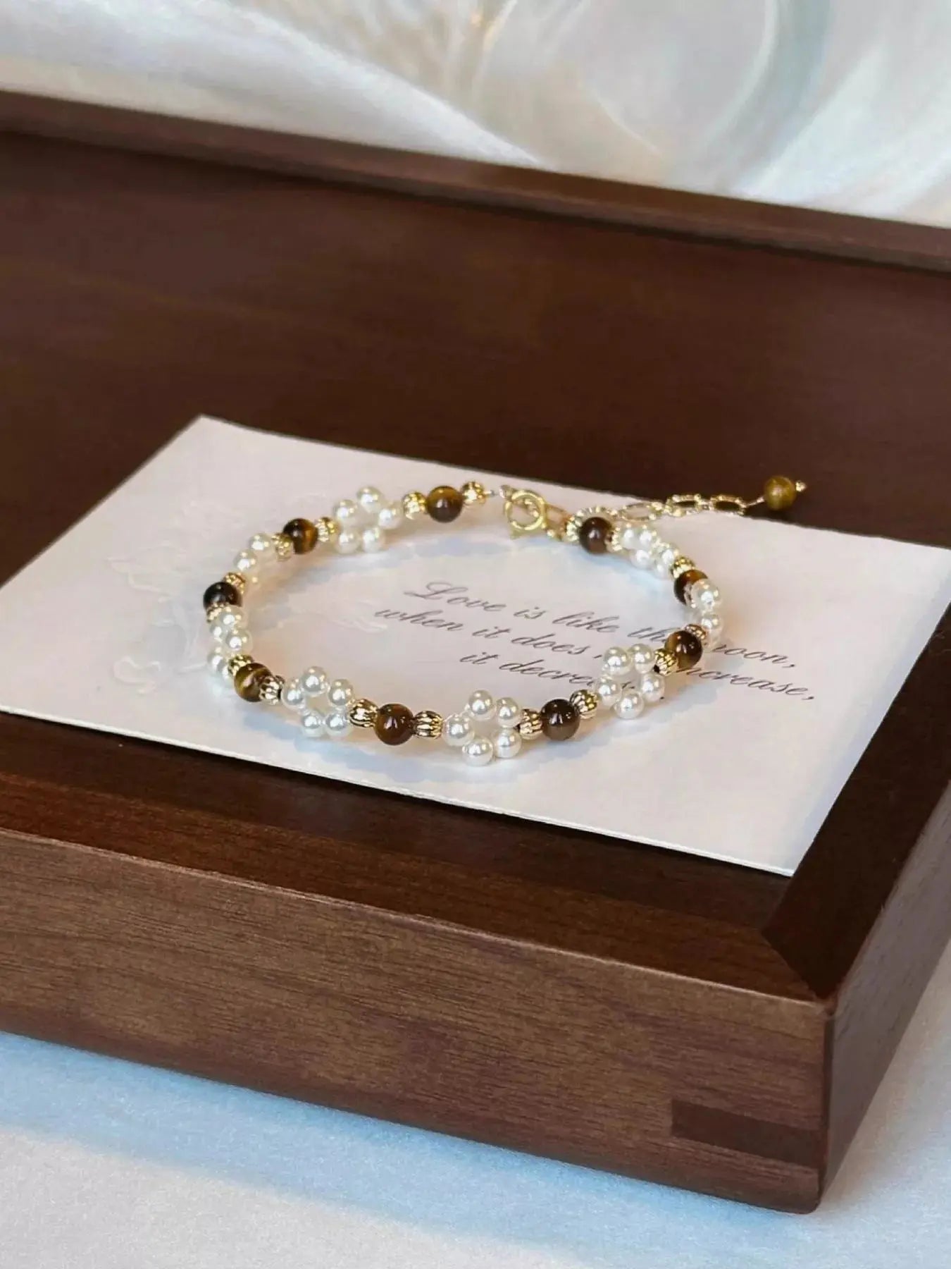 Pearl and tiger eye stone beaded bracelet from Vicsxox