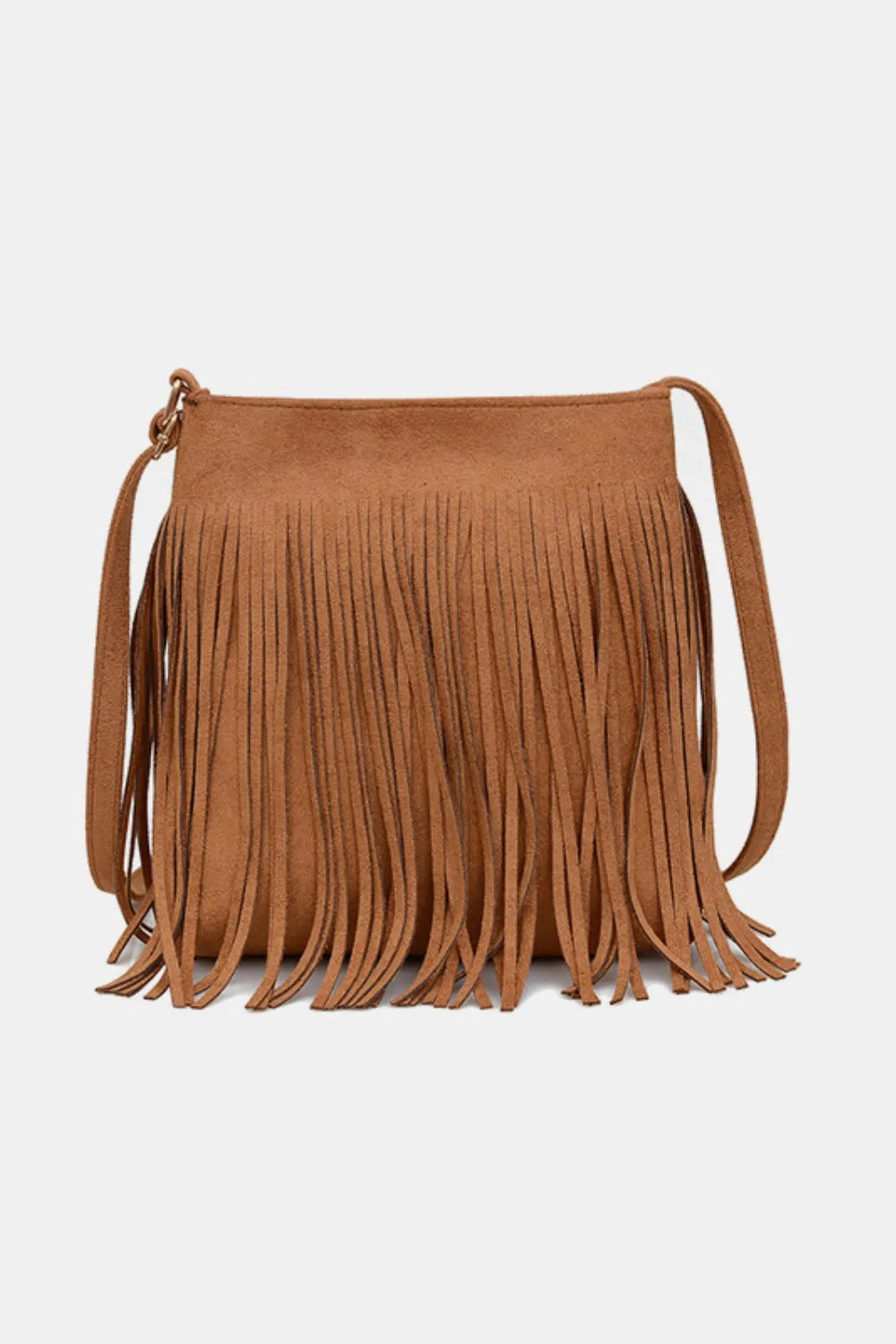 Brown suede handbag with fringes on a light gray background