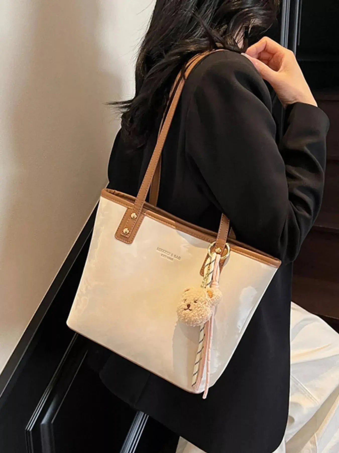 Vegan leather tote shoulder bag with plush bear charm, front view Vicsxox.com